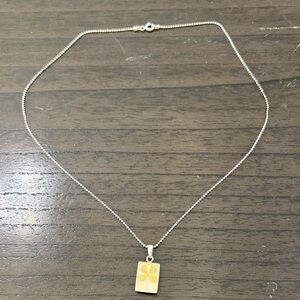 Elegant Gold and Silver Clover Necklace